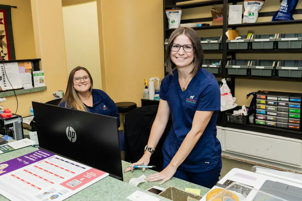 Friendly front desk staff at Nonantum Vet Clinic ready to help you